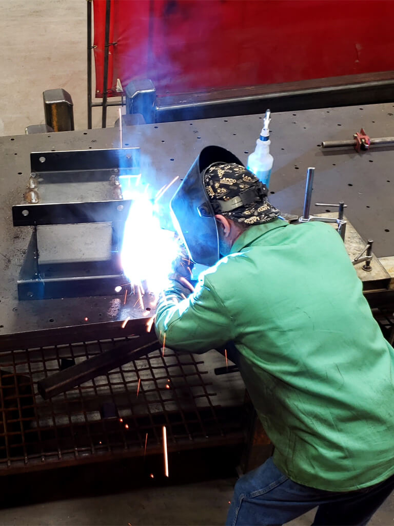TYMETAL employee welding metal